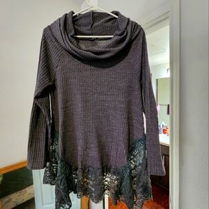 Lightweight lace trimmed sweater.